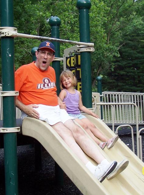 100_2803.JPG - I'm too wide to fit down the slide! -- with Sydney at the New Salem park playground.  (Now for the funnier part ... take a good look and you'll see I have two different shoes on! I didn't even realize I had two pair of similar deck shoes!)
