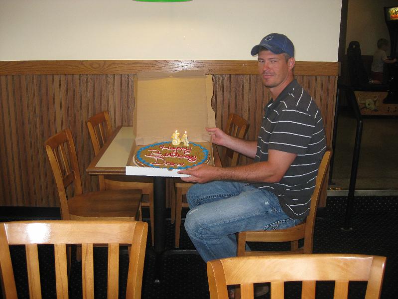 IMG_0910.JPG - Pam's second cousin Drew is shipping out to Japan for a couple of years.  Pam's cousin Rick had a birthday party for him at the Petersburg Pizza Hut before his departure.