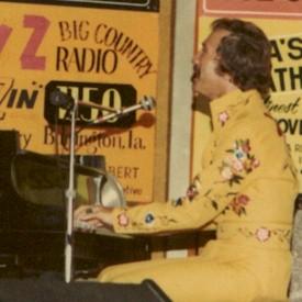 MartyAtPiano.jpg - Marty Robbins after a show.  Robbins would just hang around long after a show was done and the crowd gone, then come out and play just for the enjoyment.