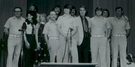 1975cast.jpg - Opry cast - 1975:  Jimmy Boward, Joannie Morrison, Dick Smith, Pam Gilbert, Jerry Hollingsworth, Phil Decker, Gary Nabors, Paul Lewis, Brian Morgan, Tom Rutledge, John Brodie, Kenny Decker.