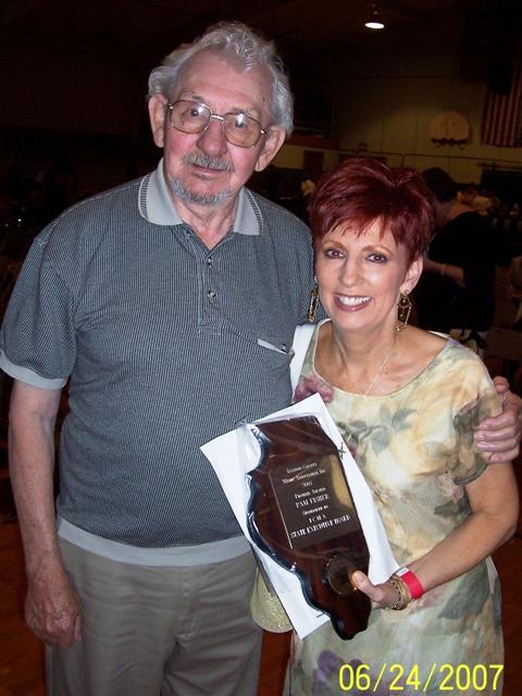 100_2829.JPG - Chet Gilbert and Pam Gilbert Fisher -- now both members of the ICMA Hall of Fame.  Chet even talked his way out of a speeding ticket on the way to the show!