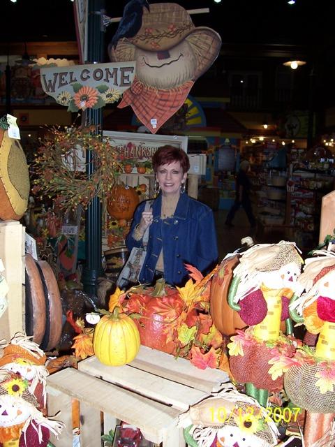 100_3126.JPG - The Emporium at Dollywod, with fall decorations and sales.