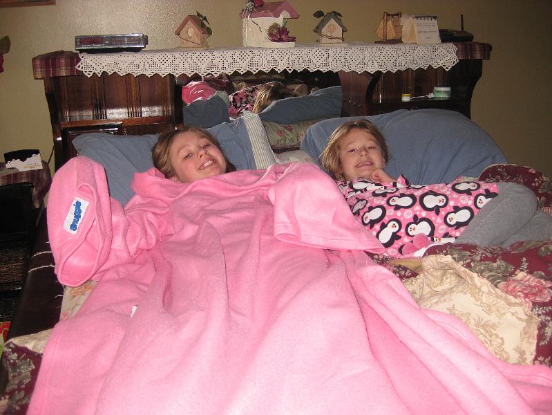 IMG_1389.JPG - Kait and Syd camped out in our bed to watch some TV.