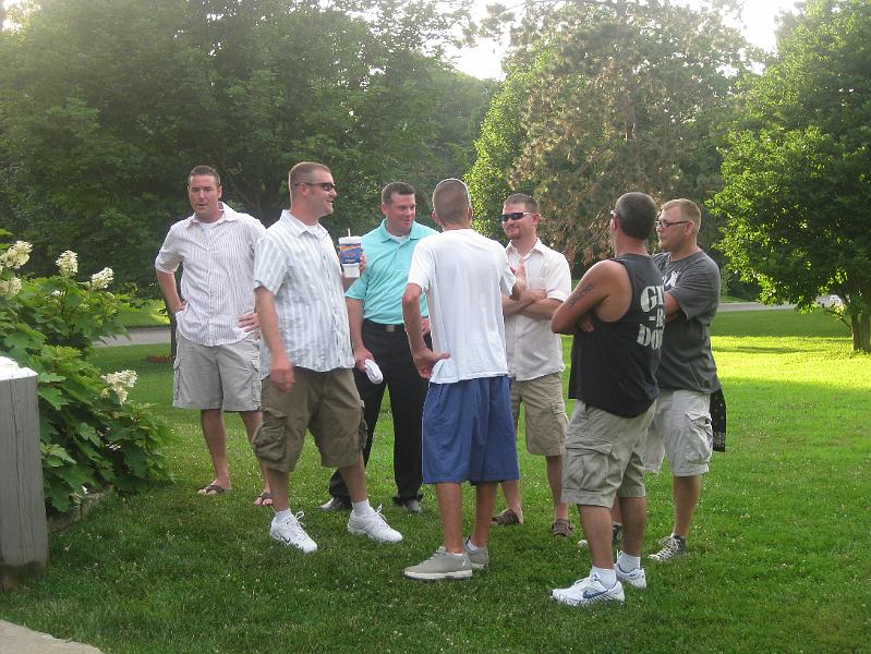 IMG_0617.JPG - ... and all the groomsmen discussing the afternoon's golf game.