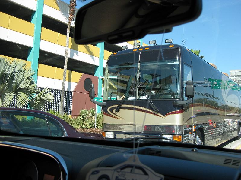 IMG_0008.JPG - All of the artists drove their buses to the port.  We had to wait for the Isaacs to pass before we could turn into the parking garage on the left.